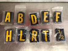Load image into Gallery viewer, ELECTROMARK or 3M Reflective 2.5&quot; Yellow on Black Letters or Numbers - 25 Count